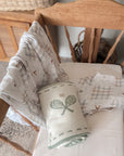Baby blankets with patterns on a wooden chair